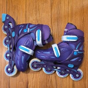 Purple and Blue Rollerblades